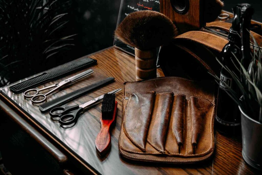 Comparison between homemade and store-bought leather cleaners on a wooden table.”