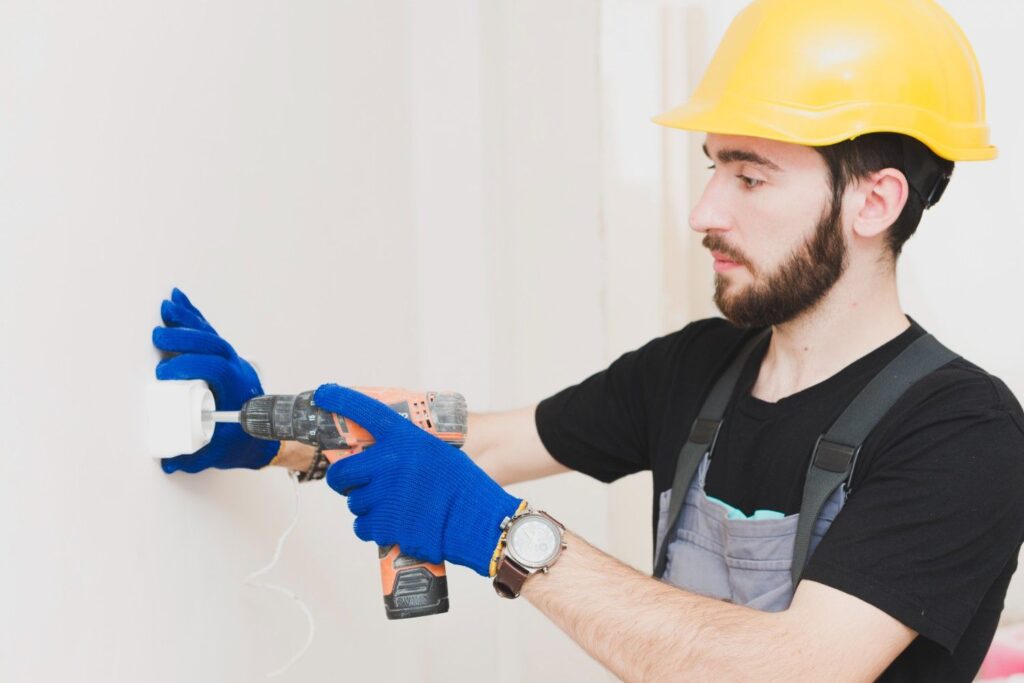 side-view-electrician-mounting-plug